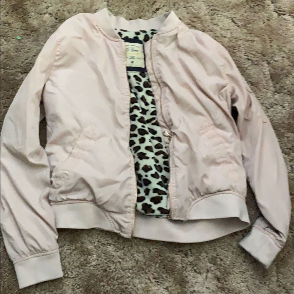 A poofy light pink jacket! (cheetah print inside)
